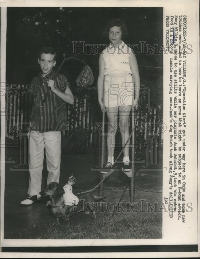 1957 Press Photo Bay Village, Ohio Susy Wilkie &amp; Jack Schmidt at play - Historic Images