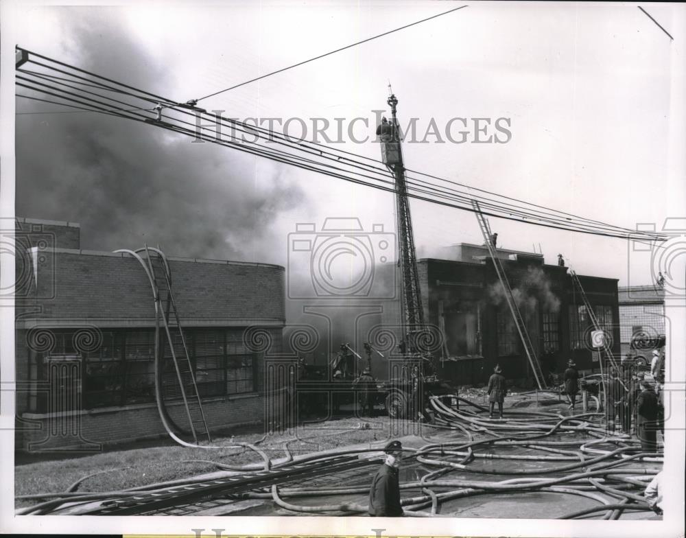 1957 Press Photo Firemen battling fire at chemical plant in Chicago - neb89908 - Historic Images