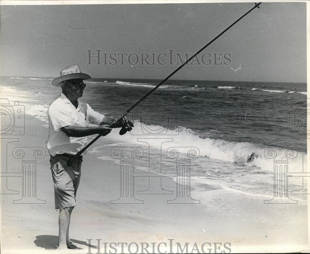 1973 Press Photo A surf fisherman on a Florida beachfront - neb86327 - Historic Images