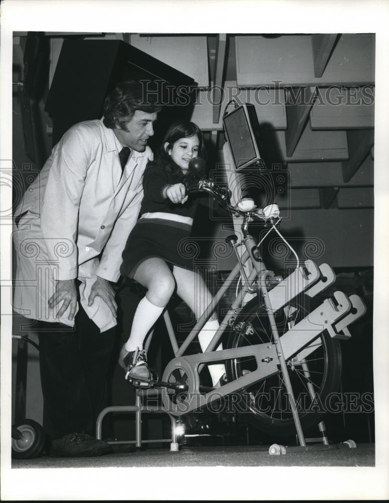 1974 Press Photo Regina Wasserman Pedals on Cycle at Energy Show - neb89354 - Historic Images