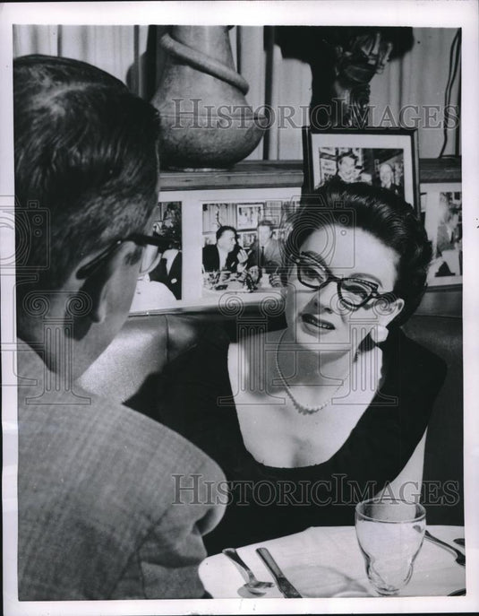 1954 Press Photo Invisible Hearing Aid Made Into Horn Rimmed Glasses by Otarion - Historic Images