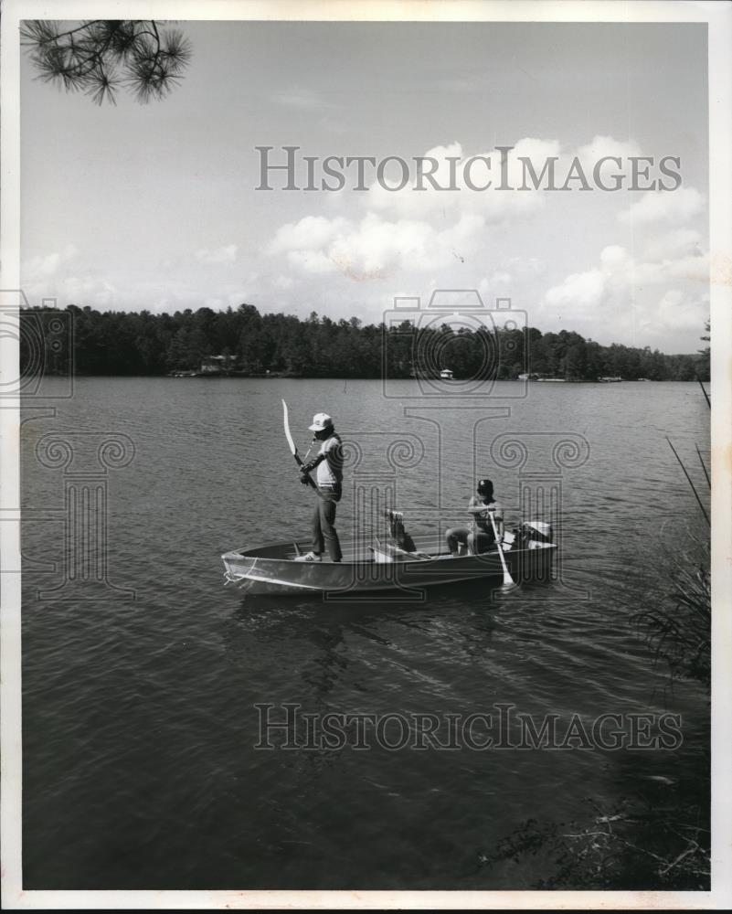 Press Photo Fishing on a lake and archery - Historic Images