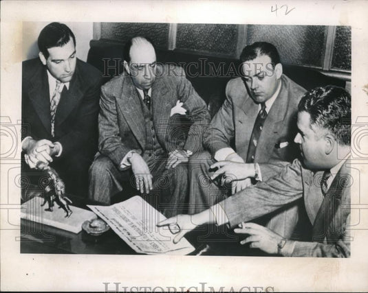 Press Photo Three Men Discussing The Newspaper - Historic Images