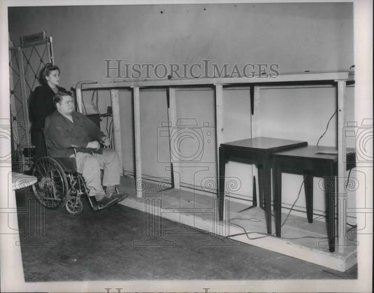 1950 Press Photo Paralyzed Veteran Al Lehman & Wife Examine Robbed Apartment - Historic Images