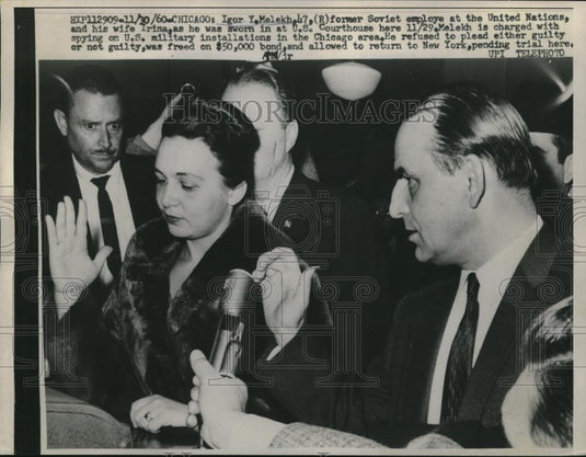 1960 Press Photo Russia's Igor Melekh with Wife Sworn in at Chicago Hearing - Historic Images