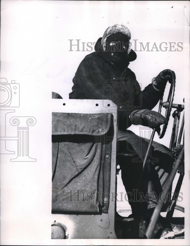 1956 Press Photo Portsmouth, N.H. Air base road grader in mask against wind - Historic Images