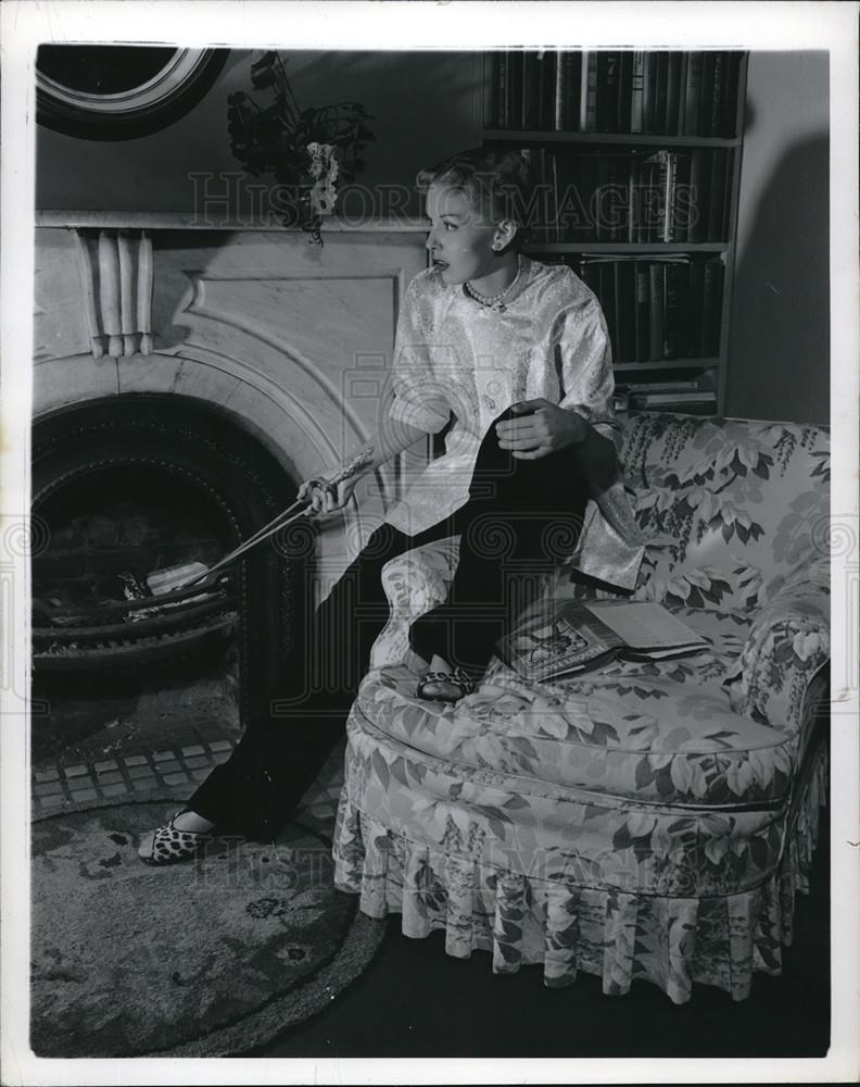 1969 Press Photo Young Woman Model In Front of Fireplace Display - Historic Images