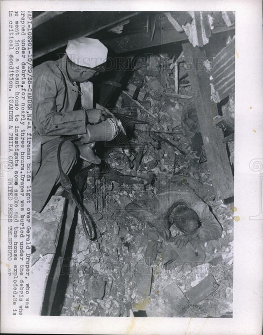 1955 Press Photo Camden,NJ fireman & G Draper trapped in home by gas explosion - Historic Images