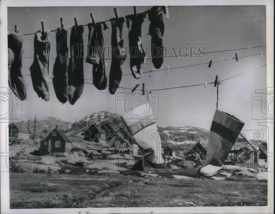 1952 Press Photo Godthaab, Greenland, boots & socks dry on clothsline - Historic Images