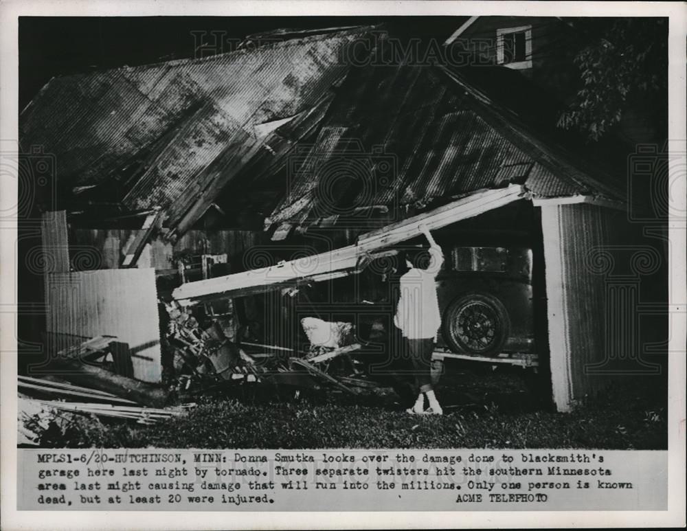 1951 Press Photo 3 separate twisters hit MN Donna Smutka looks over damage - Historic Images