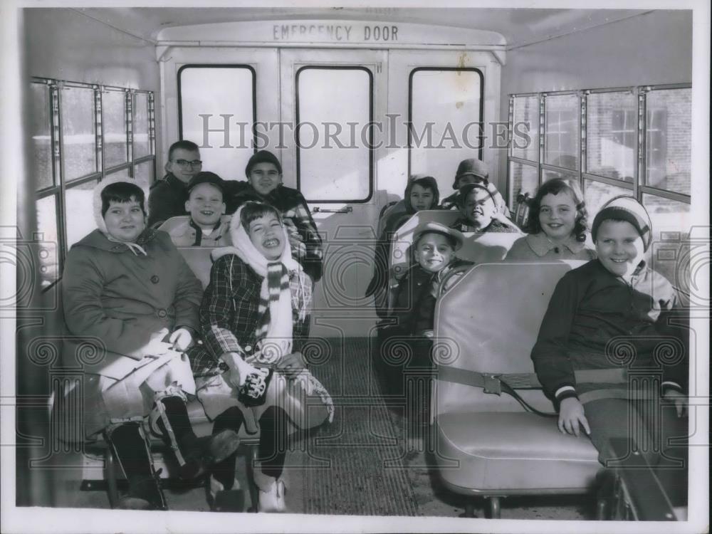 1961 Press Photo Parma, OH students in school bus with seat straps - neb95493 - Historic Images