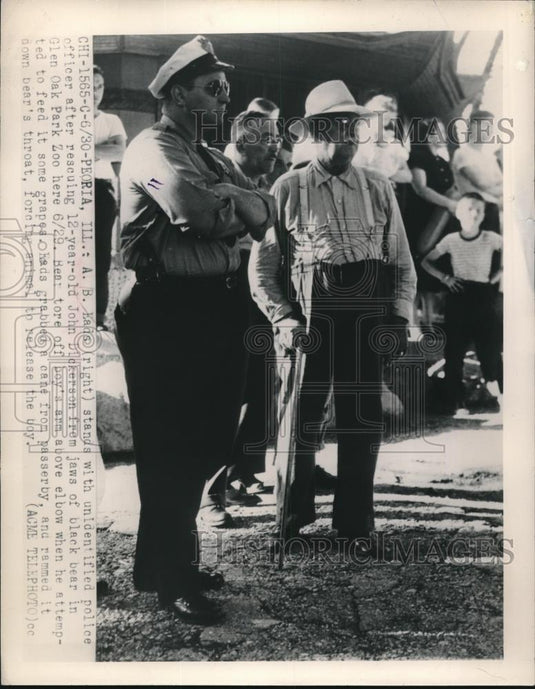 1948 Press Photo AB Kads & Police Officer Rescues Kid from Bears at Zoo - Historic Images