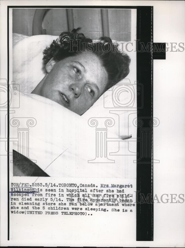 1957 Press Photo Toronto, Canada Mrs Margaret Wilkinsoin in hospital from a fire - Historic Images