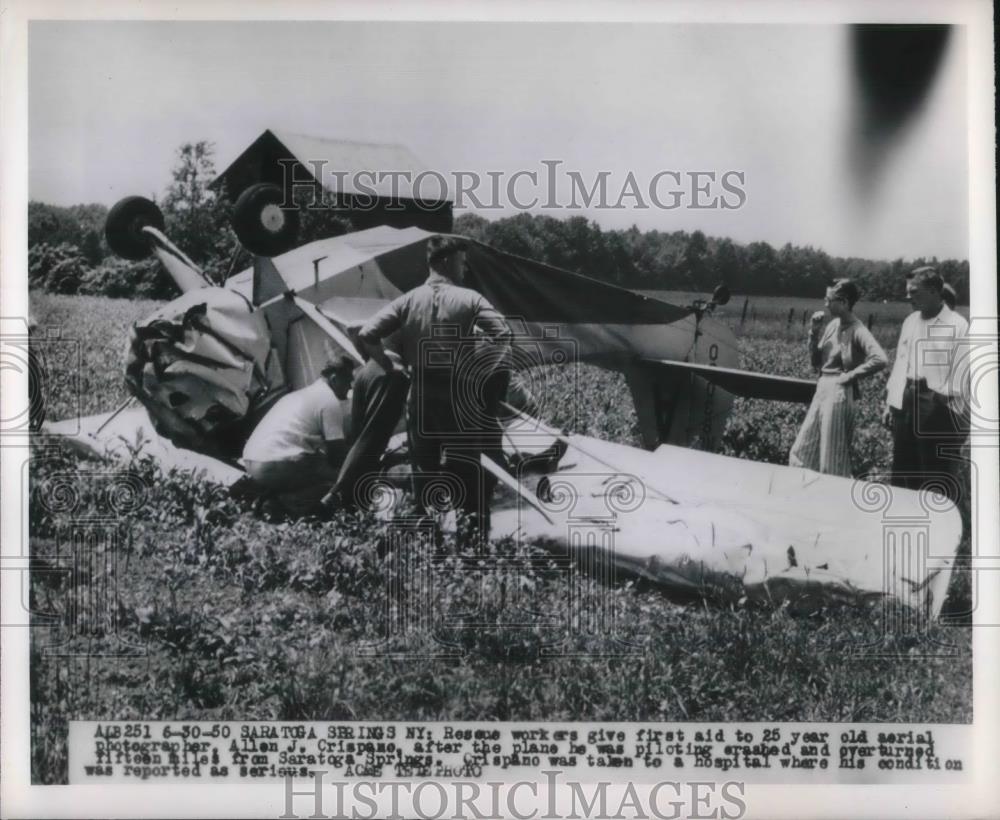 1950 Press Photo Rescue Workers Help 25-Year-Old Crash Victim Allen Crispane - Historic Images