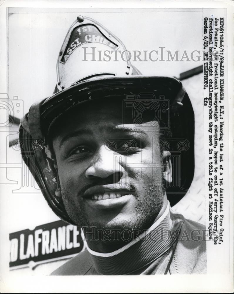 1969 Press Photo Boxing Champ Joe Frazier In Fireman Hat, New York - nes09018 - Historic Images