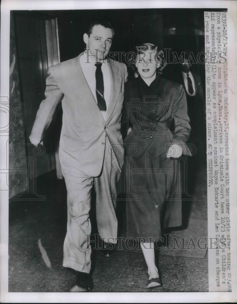 1951 Press Photo Roberta McCauley arrested with 2 other girls robbery $23,000 - Historic Images