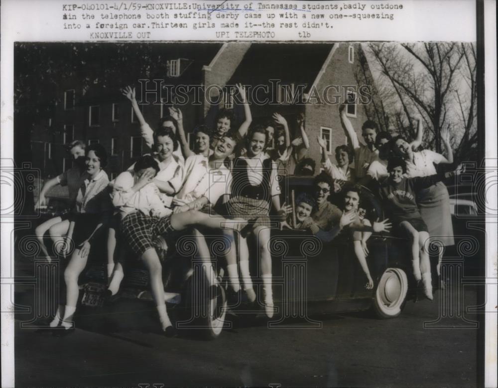 1959 Press Photo  UT Knoxville Students Try Auto Stuffing - Historic Images