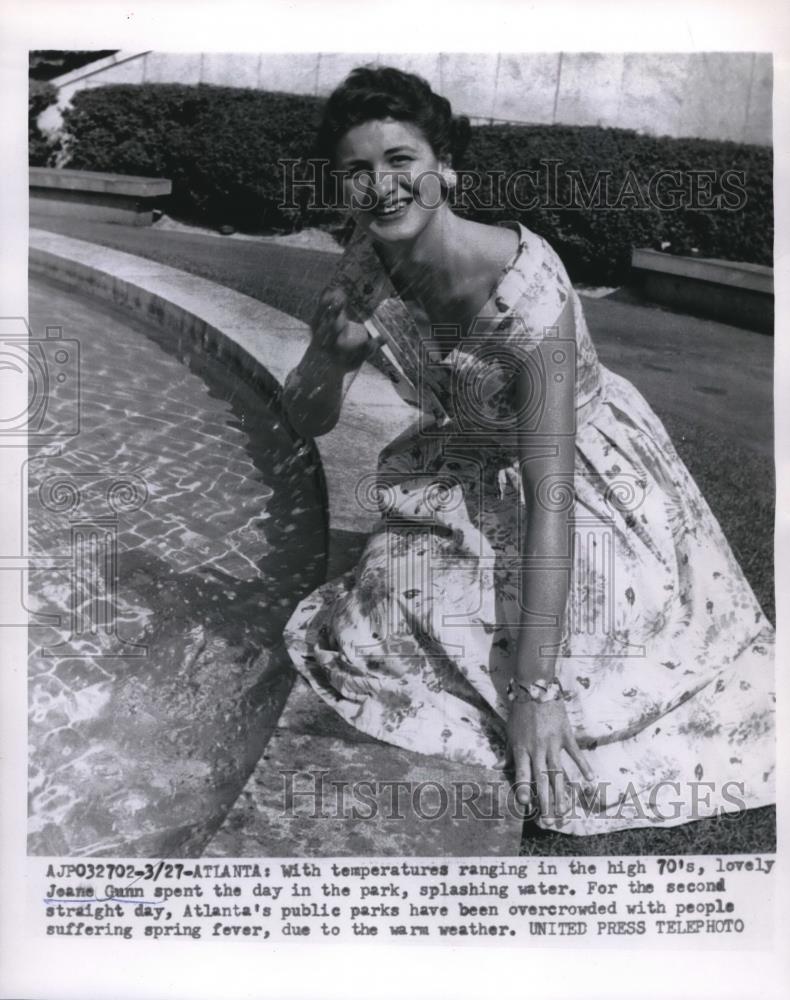 1956 Press Photo Jeanne Gunn in park overcrowding due to spring weather - Historic Images