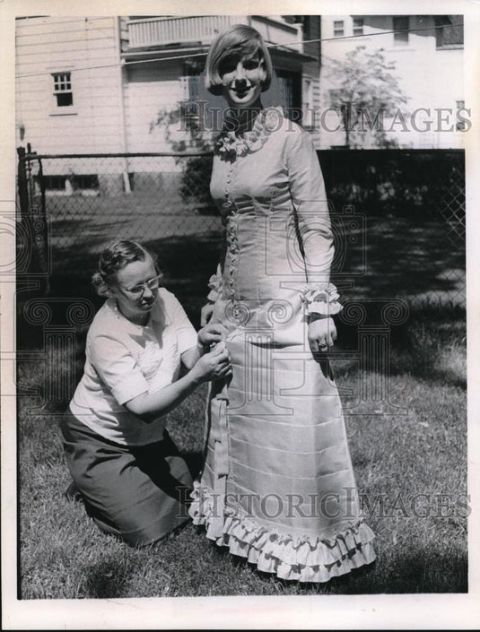 Press Photo Sally's new graduation gown - nec39412 - Historic Images