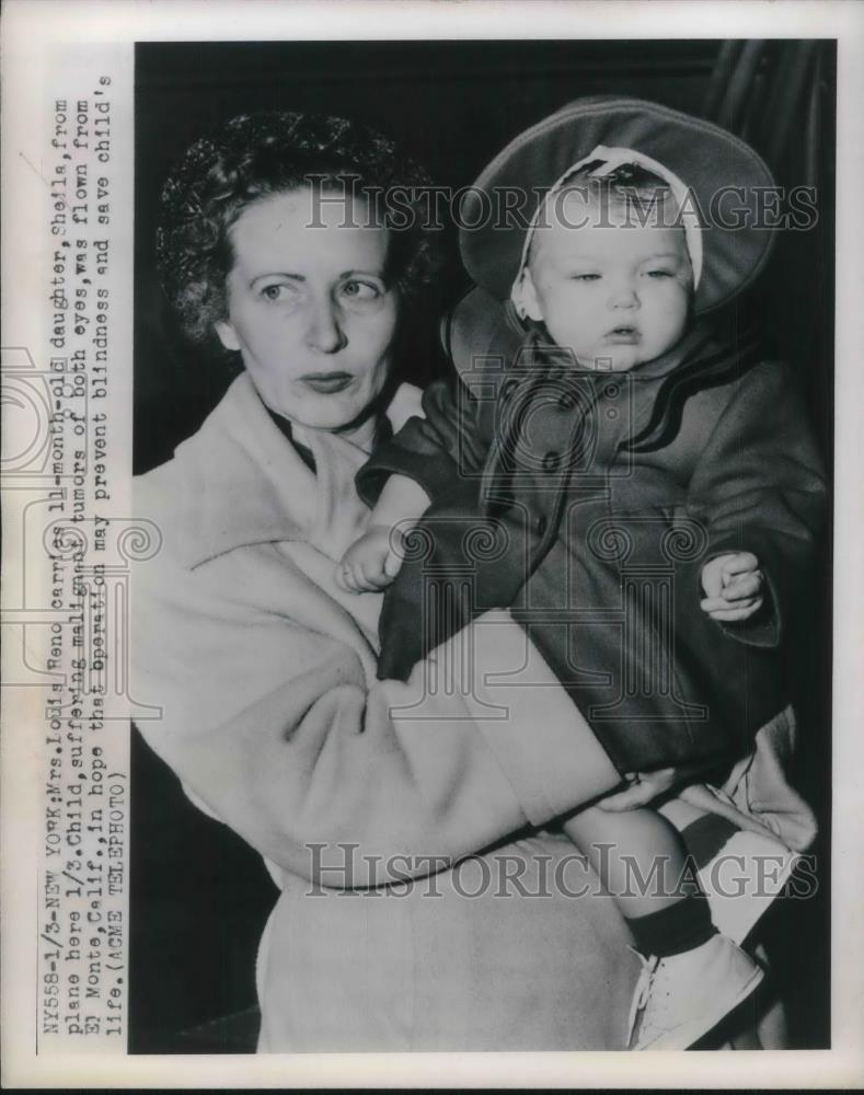 1949 Press Photo Mrs. Louis Reno carries 11 month old daughter, Shelia, - Historic Images