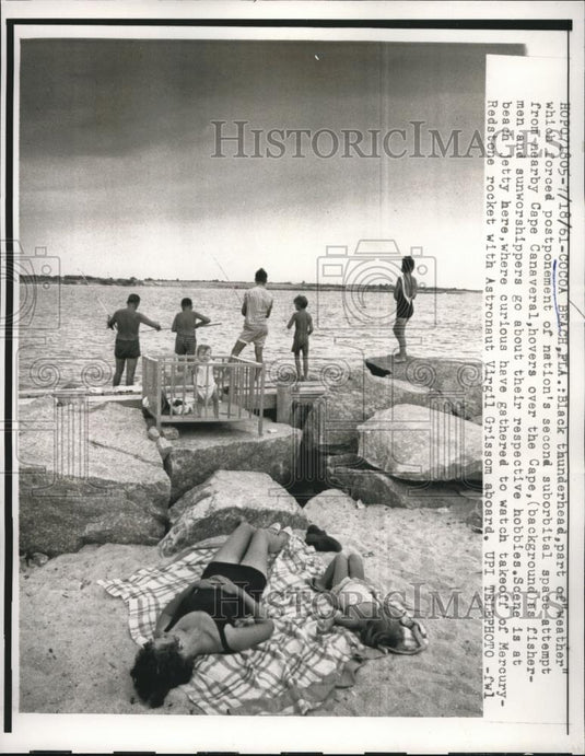 1961 Press Photo Fishermen and sunworshippers do their hobbies at Beach Jetty. - Historic Images