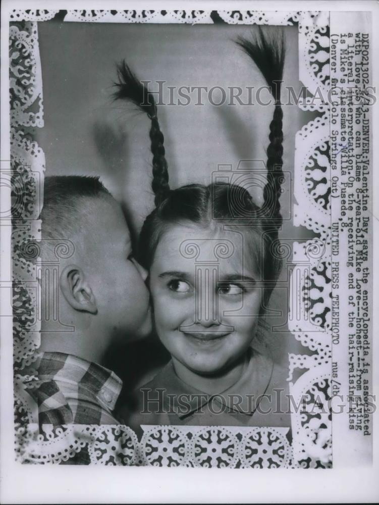 1957 Press Photo 8-year-old Mike Love giving a hair raising kiss to Willa Pusede - Historic Images