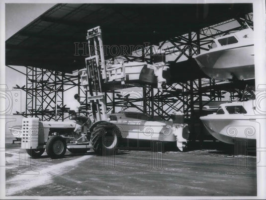 1960 Press Photo Forklift makes triple storage at City Island Marina Sarasota FL - Historic Images