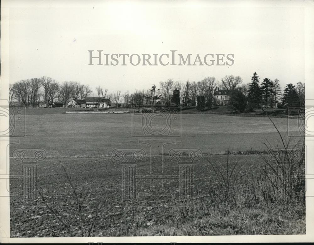 1936 Press Photo Hay Field with estate house at right side - nec35835 - Historic Images
