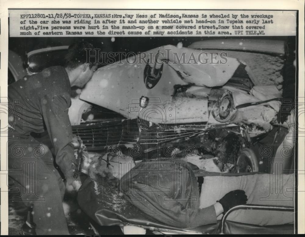 1958 Press Photo Mrs Ray Hess Wheeled by Wreckage of Car she Was in Topeka Kansa - Historic Images