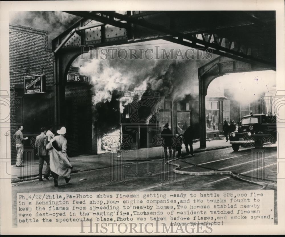 1948 Press Photo Phila.Pa firemen at Kensington feed shop fire - nec35455 - Historic Images