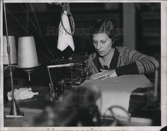 1934 Press Photo "Serging" Edge of Fabric Carmella Maleonico - nec30913 - Historic Images