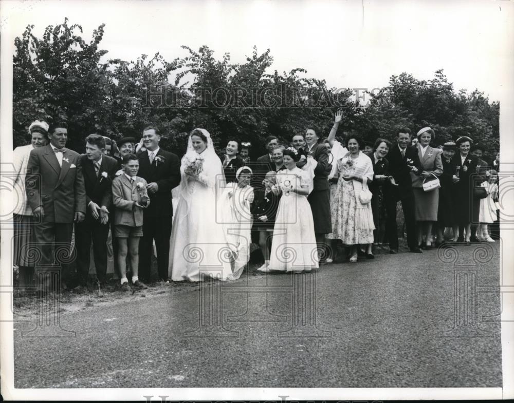 1956 Press Photo Wedding interrupted by Tour De. France bicycle racers. - Historic Images