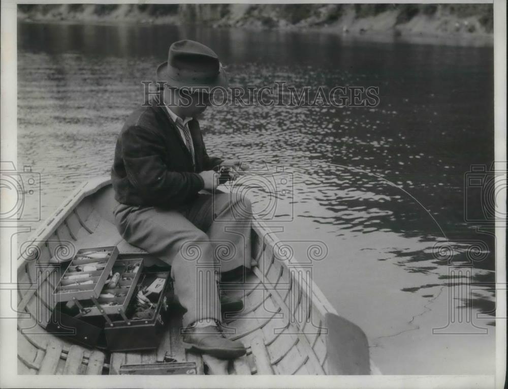 1933 Press Photo Jimmy Donahue Fishing in a Boat - Historic Images