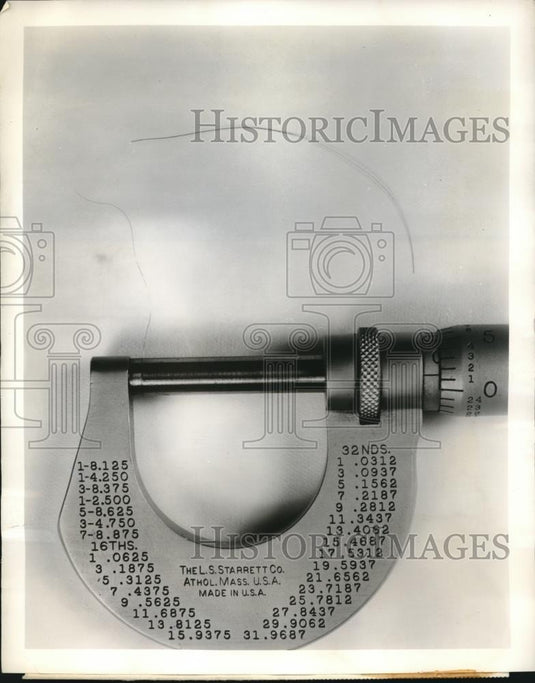 1955 Press Photo Superior Tube Company, tiny tube & micrometer - nec70865 - Historic Images