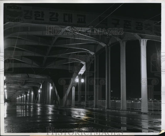 1958 Press Photo Lights illuminate Han River bridge in Korea - Historic Images