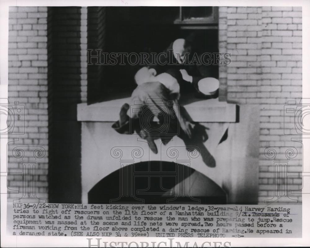 1955 Press Photo Harvey Harding Fights Off Rescuers on 11th Floor Building - Historic Images