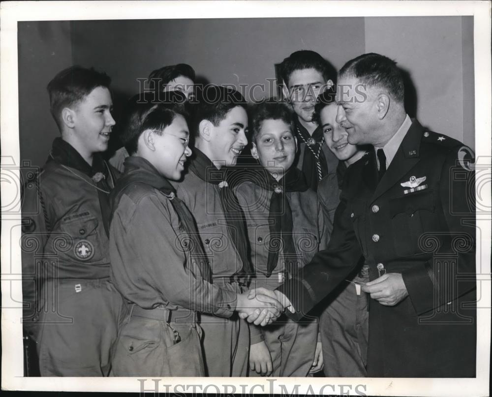 1942 Press Photo John C. McDonell meets and shakes hands with scout George Wu - Historic Images