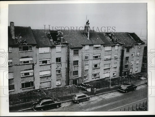 1968 Press Photo Greenock Scotland Holes in roofs caused by chimney stacks - Historic Images