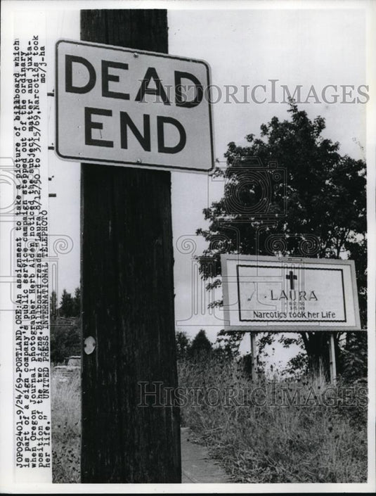 1969 Press Photo Portland Ore Billboard & traffic signs in a pun setting - Historic Images