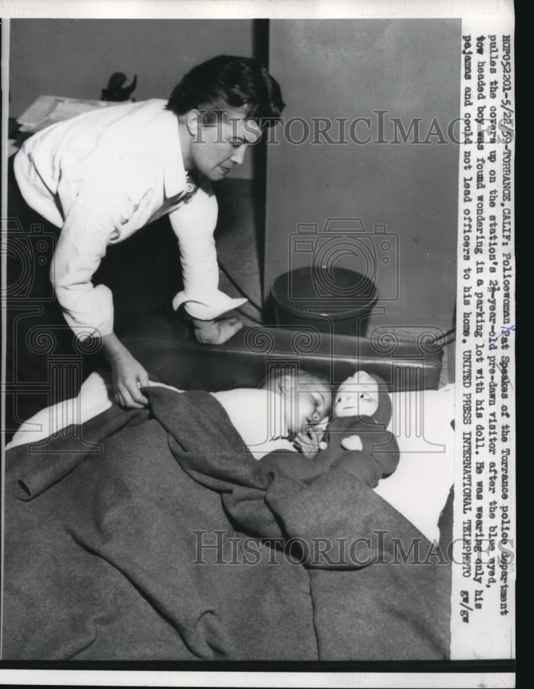 1959 Press Photo A lost boy was found and being take cared by California Police - Historic Images