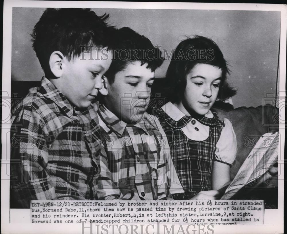 1954 Press Photo Handicapped Norman was welcomed by brother and sister - Historic Images