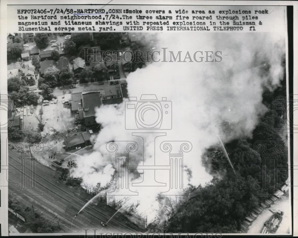 1958 Press Photo An Explosions at the Suisman &amp; Bluementh scrape metal yard - Historic Images