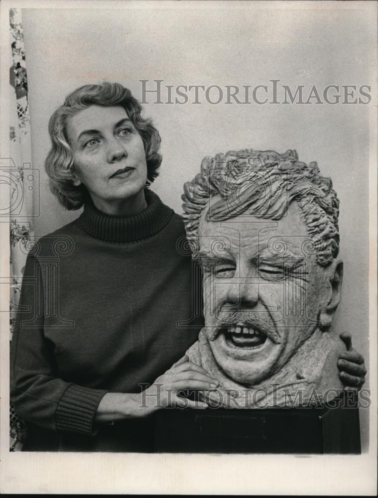 1966 Press Photo Mrs. Robert Maury with a sculptured face of a man - ned02109 - Historic Images