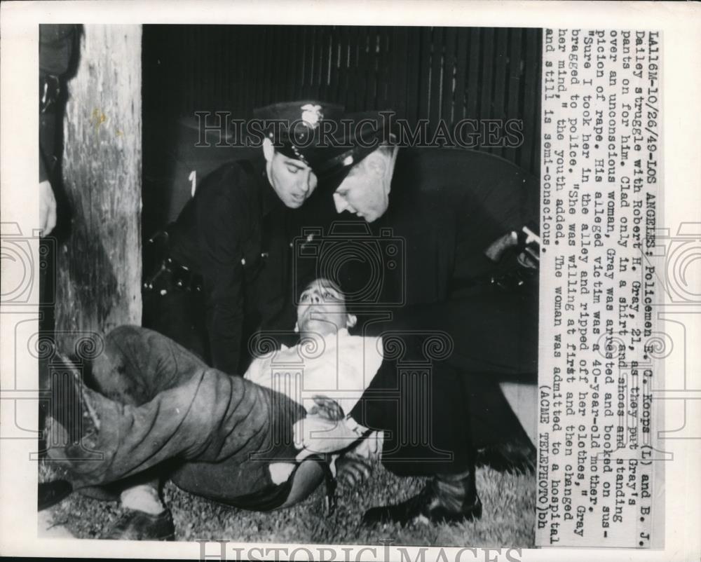 1949 Media Photo Los Angeles Policemen E Q Koops and B J Dailey struggle with - Historic Images