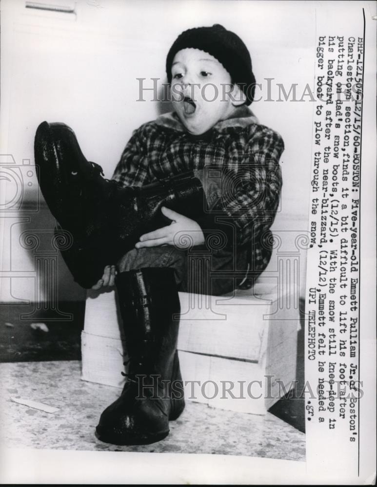 1960 Media Photo Emmett Pulliam Jr. putting on Dad&#39;s snow boots. - Historic Images