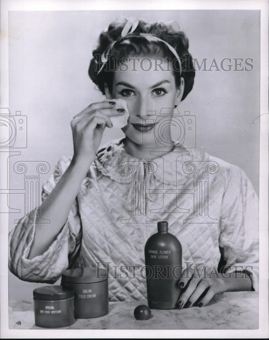 1955 Press Photo Model showing how to care for your face - Historic Images