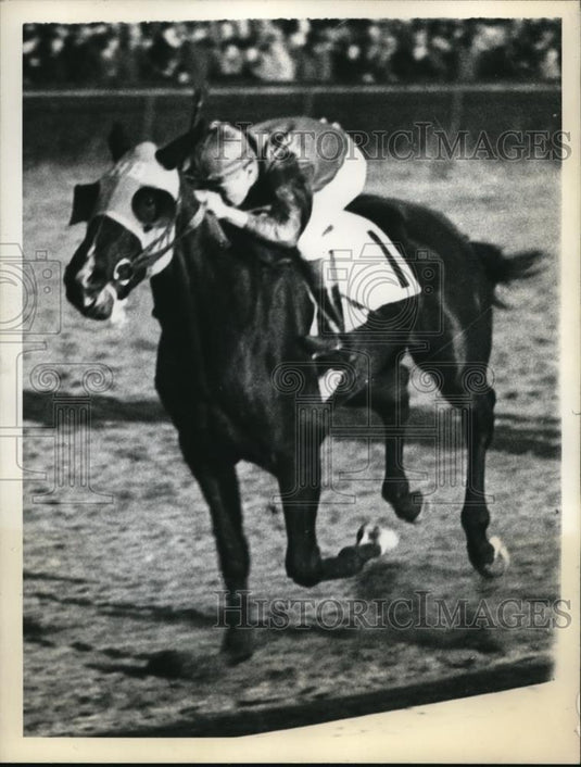 1938 Press Photo Jockey aboard a racehorse - nes19985 - Historic Images
