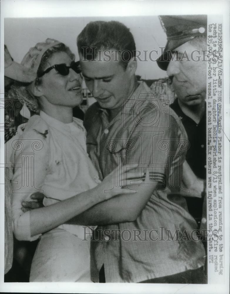 1961 Press Photo Mrs. Maxine Fisher Restrained From Running To Burning Boat - Historic Images