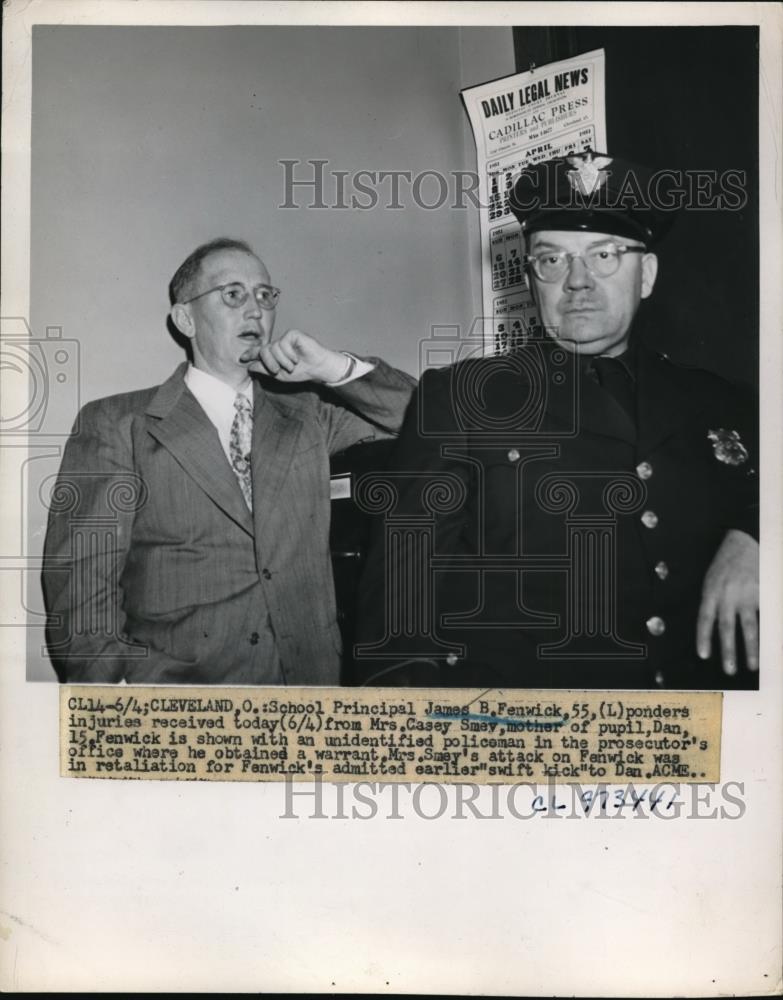 1932 Press Photo Cleveland Ohio Principal James Fenwick ponders injuies received - Historic Images