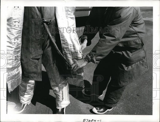 1958 Press Photo Close-up of new Air Force Aluminum Coated Heat-Protective suits - Historic Images